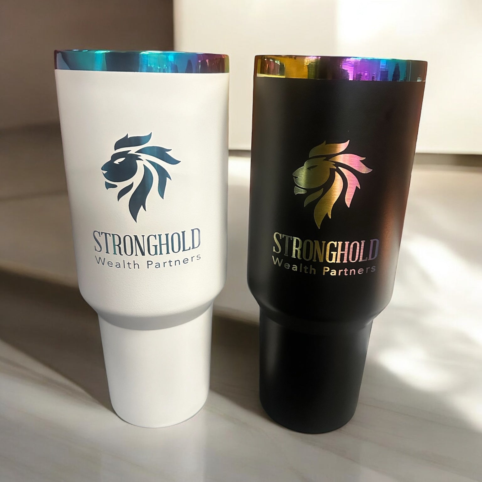 customized rainbow-plated tumblers in white & black