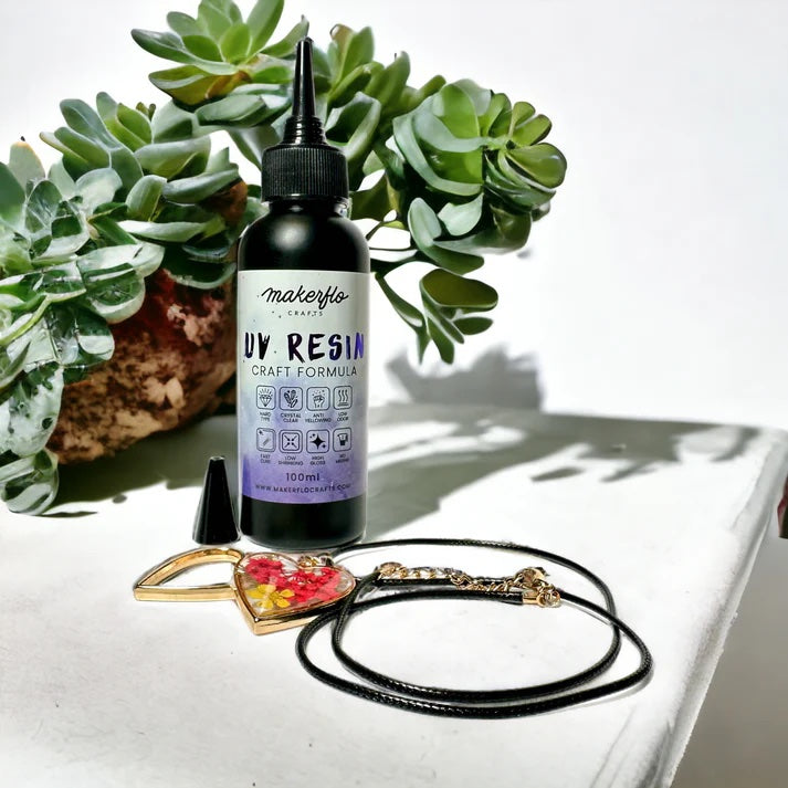 uv resin bottle with uv resin crafted necklace