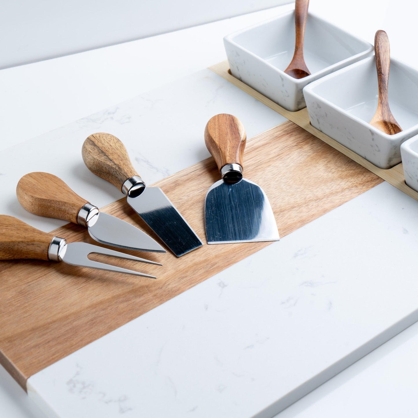 charcuterie board with serving pieces