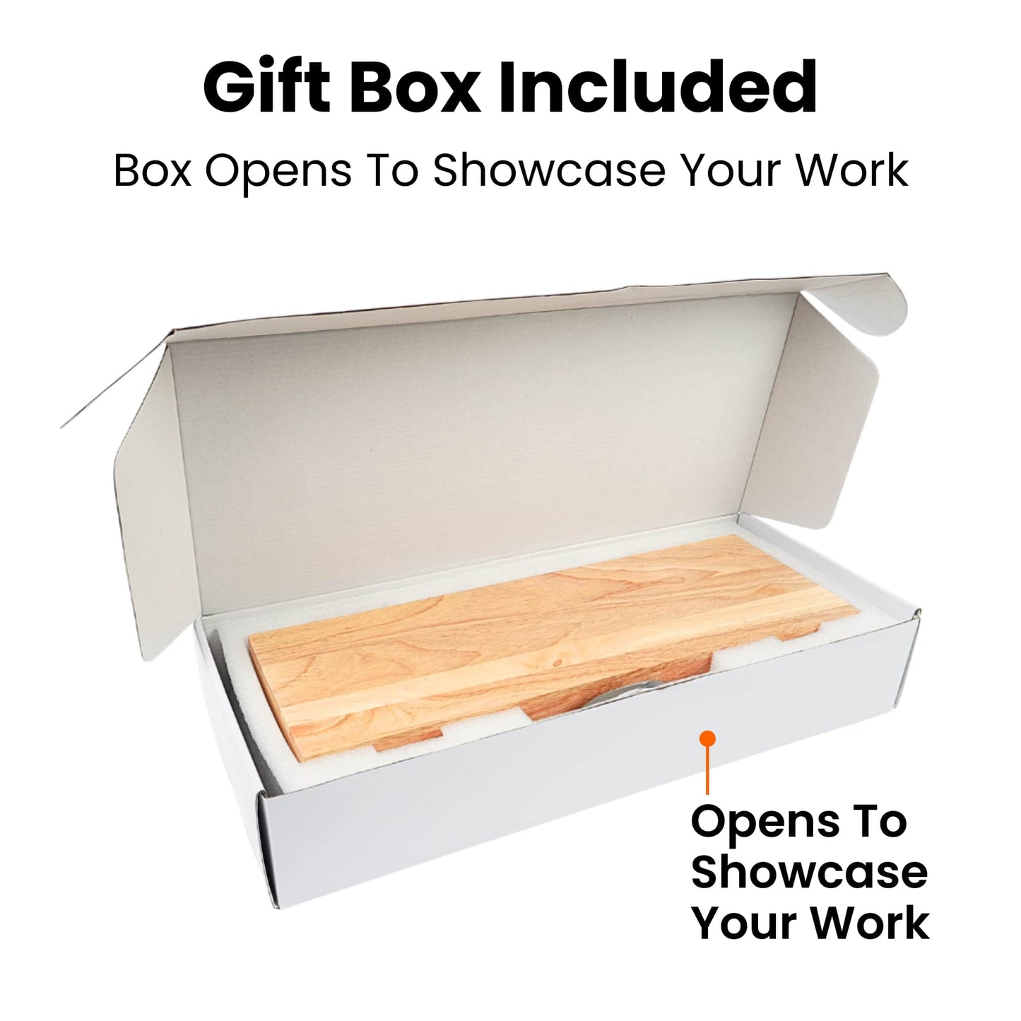 A white cardboard gift box shown open on a white background, with a light wood board or tray inside. Text above and below reads 'Gift-Ready Wow-Ready' and 'Box Opens To Showcase Your Work,' with an orange pointer line to the bottom text.