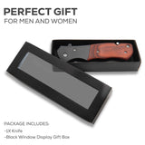 Knife with wooden handle in a black display box on a white background