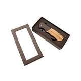 Wooden-handled knife in a brown box on a white background
