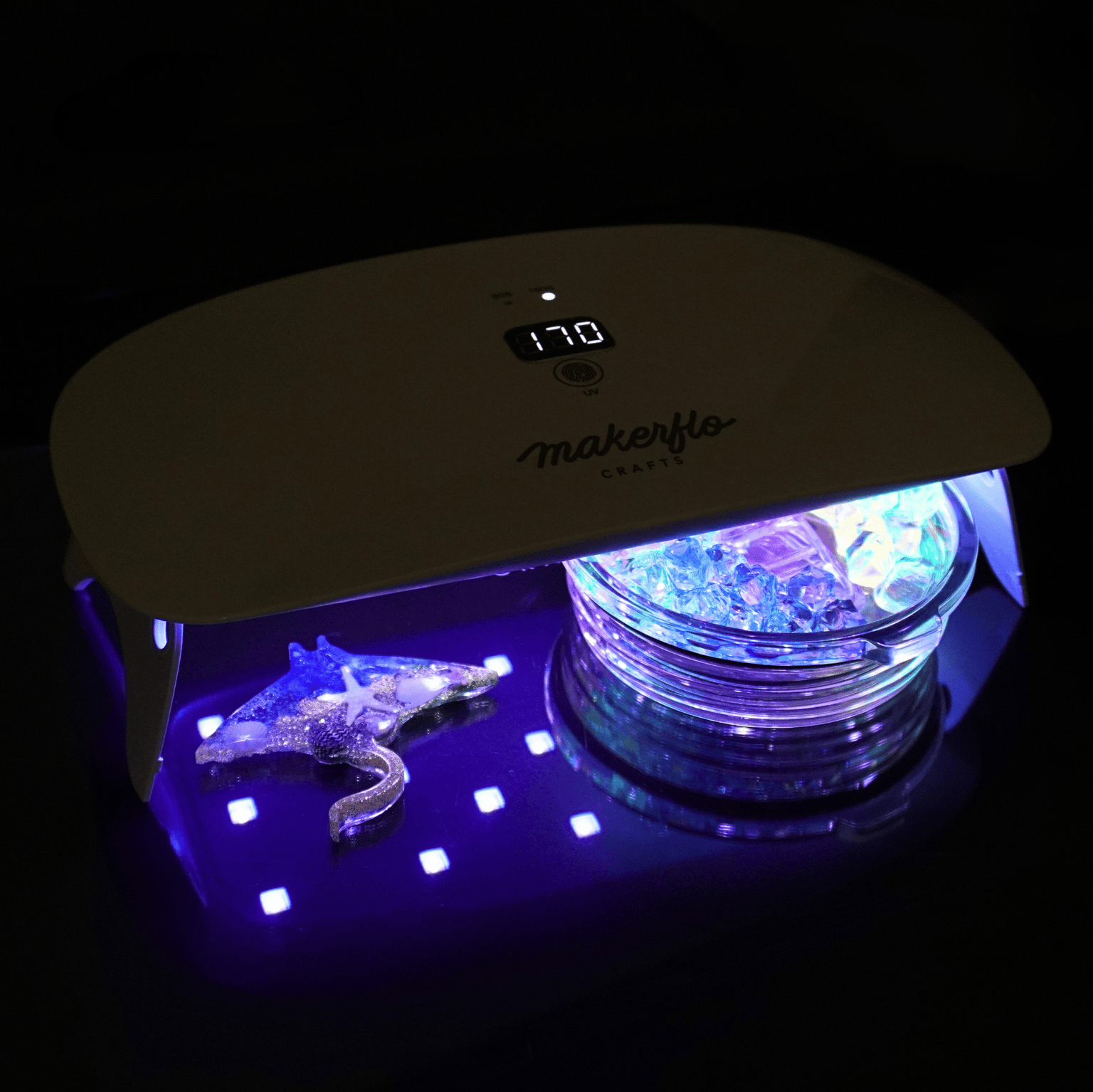uv resin light shown curing animal mold and tumbler topper lid